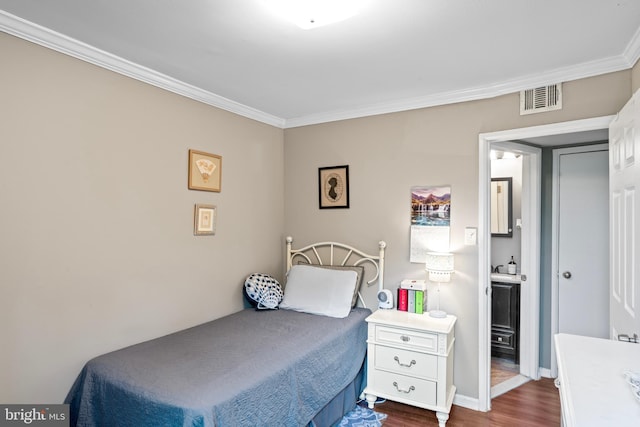 9615 51st Pl, College Park, MD 20740 - bedroom featuring dark wood finished floors and crown molding