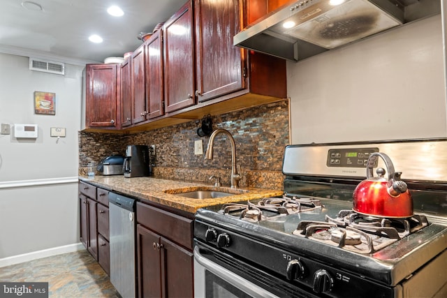 9615 51st Pl, College Park, MD 20740 - kitchen with stainless steel appliances, a sink, wall chimney range hood, tasteful backsplash, and baseboards
