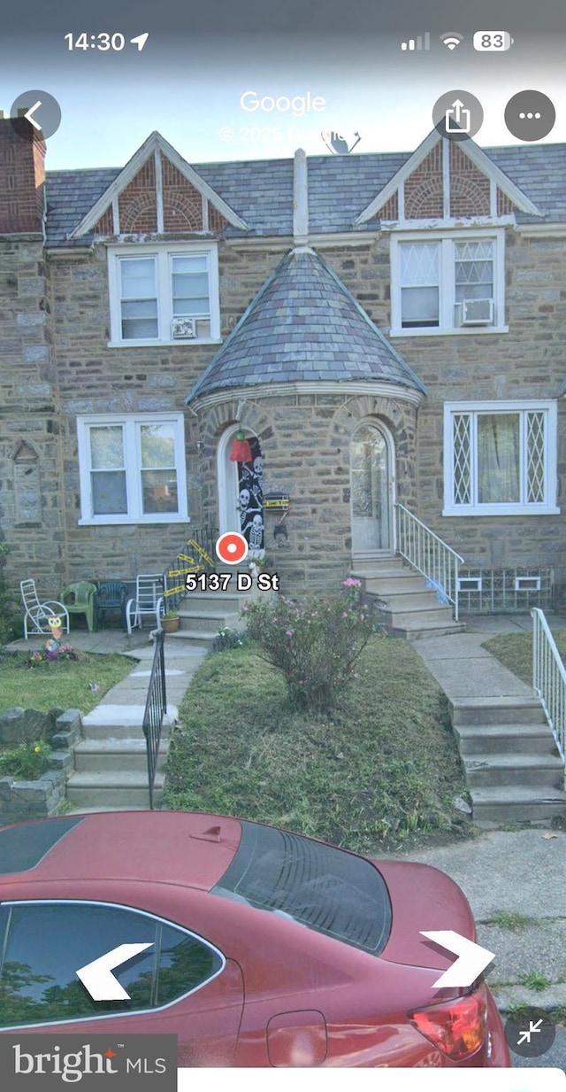 5137 D St, Philadelphia, PA 19120 - view of front of house featuring a high end roof, stone siding, and stairs