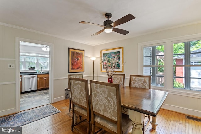 20 Oberlin Ave, Swarthmore, PA 19081 - dining space featuring plenty of natural light, light wood finished floors, baseboards, ceiling fan, and ornamental molding