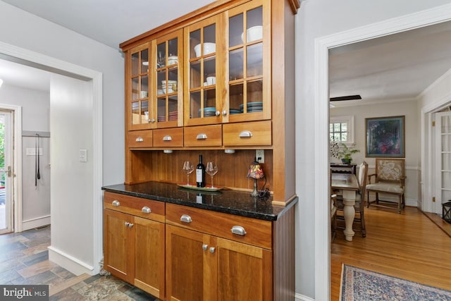 20 Oberlin Ave, Swarthmore, PA 19081 - bar featuring healthy amount of natural light, baseboards, and crown molding
