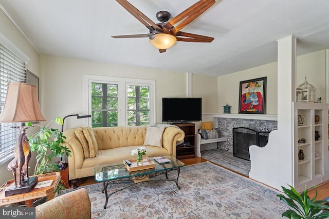20 Oberlin Ave, Swarthmore, PA 19081 - living room with ceiling fan, wood finished floors, and a stone fireplace