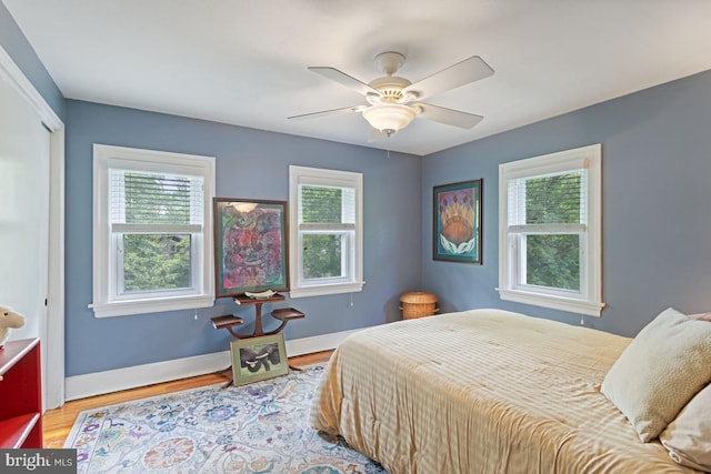 20 Oberlin Ave, Swarthmore, PA 19081 - bedroom with wood finished floors, baseboards, ceiling fan, and a closet
