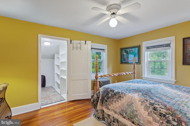 20 Oberlin Ave, Swarthmore, PA 19081 - bedroom featuring wood finished floors, multiple windows, baseboards, and a walk in closet