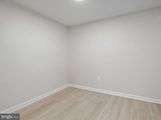 14282 Newbern Loop, Gainesville, VA 20155 - spare room with light wood-style floors and baseboards