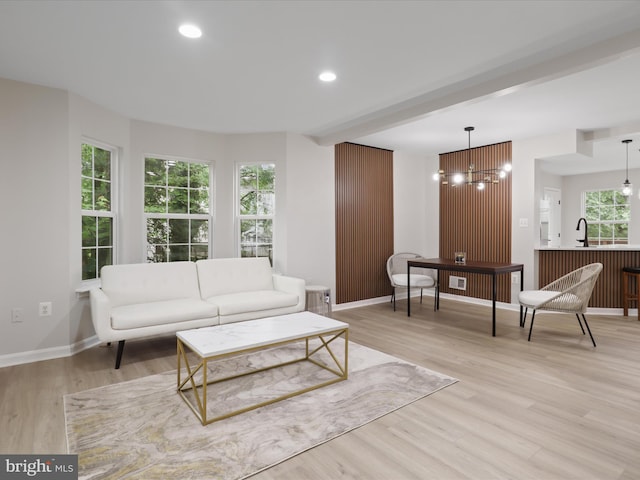 14282 Newbern Loop, Gainesville, VA 20155 - living room featuring a chandelier, light wood finished floors, baseboards, and recessed lighting