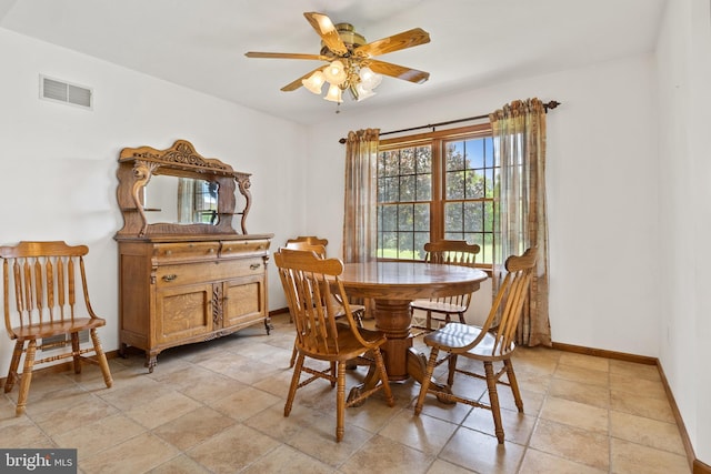 25 Warm Breeze Ct, Hanover, PA 17331 - dining space featuring baseboards, ceiling fan, and light stone finish flooring