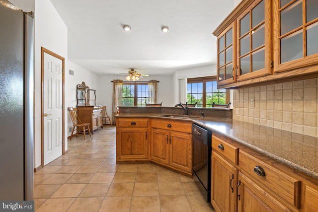 25 Warm Breeze Ct, Hanover, PA 17331 - kitchen with a sink, dishwasher, backsplash, brown cabinets, and a peninsula