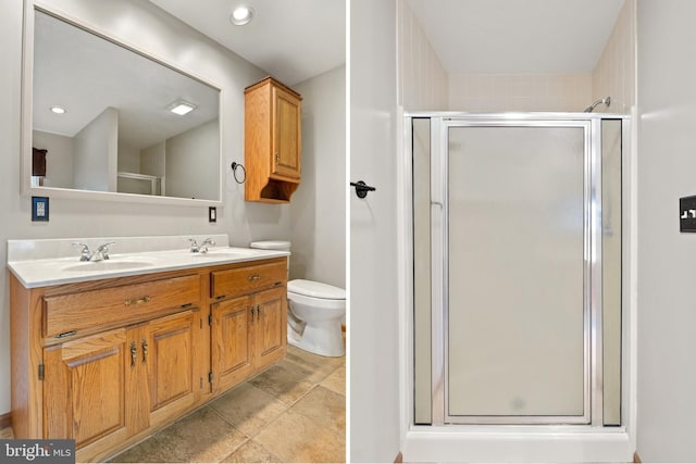 25 Warm Breeze Ct, Hanover, PA 17331 - bathroom with double vanity, a shower stall, and toilet