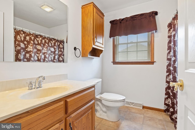 25 Warm Breeze Ct, Hanover, PA 17331 - bathroom featuring vanity, toilet, and baseboards