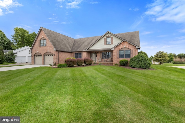 25 Warm Breeze Ct, Hanover, PA 17331 - traditional-style house featuring brick siding, driveway, a front lawn, a shingled roof, and covered porch