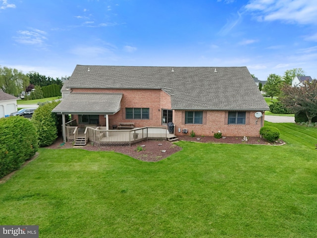 25 Warm Breeze Ct, Hanover, PA 17331 - back of house featuring brick siding, a shingled roof, a yard, and a deck