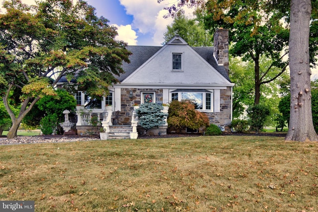 6 Terrace Rd, Plymouth Meeting, PA 19462 - view of front of property with a chimney, stone siding, and a front yard