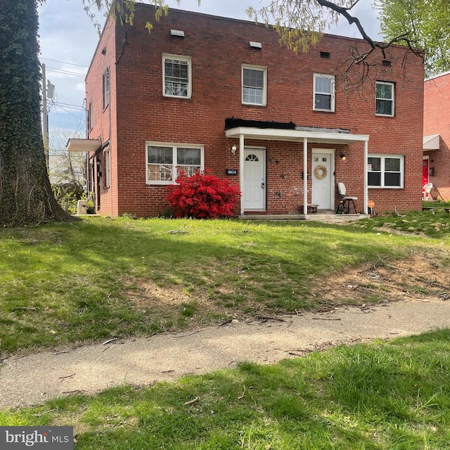 8528 Chestnut Oak, Baltimore, MD 21234 - view of front of house featuring brick siding and a front yard