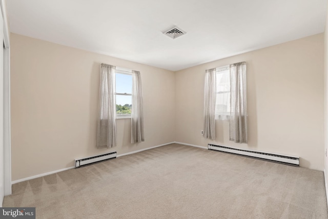 559 Schenely Ave, King Of Prussia, PA 19406 - spare room featuring a baseboard radiator, baseboard heating, and carpet flooring
