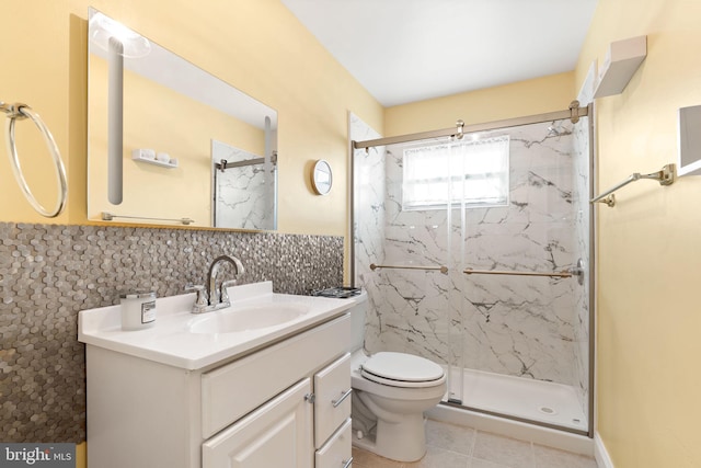 559 Schenely Ave, King Of Prussia, PA 19406 - bathroom with a marble finish shower, tile patterned flooring, vanity, and tile walls