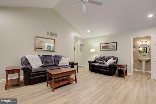 2119 Saint Heather Ln, Gambrills, MD 21054 - living area with baseboards, light wood-type flooring, a ceiling fan, high vaulted ceiling, and recessed lighting