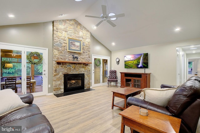 2119 Saint Heather Ln, Gambrills, MD 21054 - living area featuring light wood-style floors, a ceiling fan, a fireplace, recessed lighting, and high vaulted ceiling