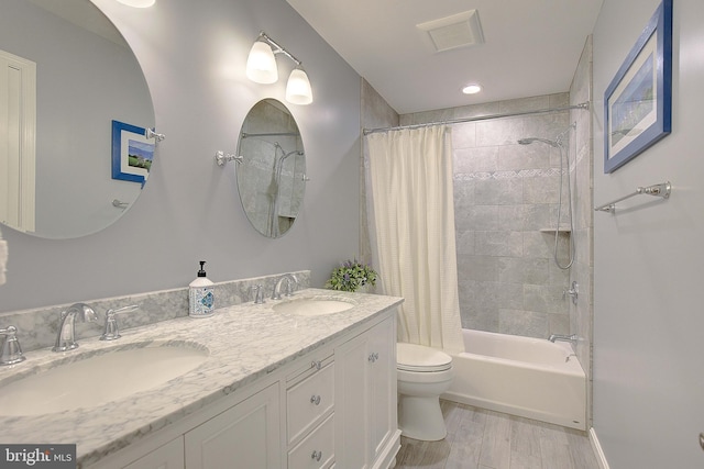 2119 Saint Heather Ln, Gambrills, MD 21054 - full bathroom with toilet, shower / bath combination with curtain, double vanity, and wood finished floors