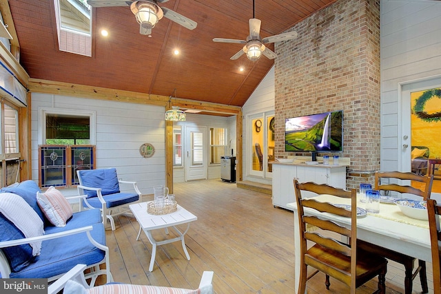 2119 Saint Heather Ln, Gambrills, MD 21054 - living area with ceiling fan, wooden walls, light wood-style flooring, wood ceiling, and high vaulted ceiling