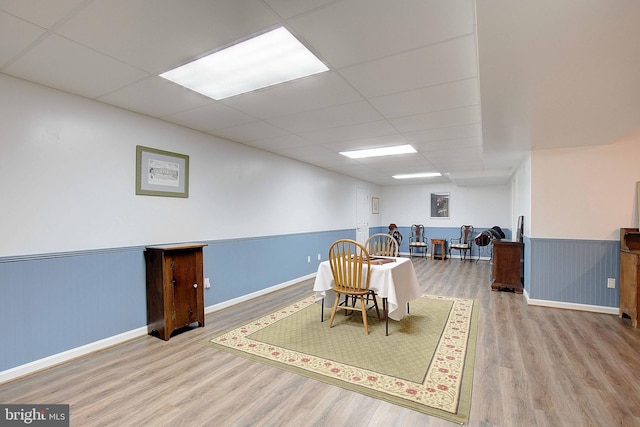 2119 Saint Heather Ln, Gambrills, MD 21054 - dining space featuring wood finished floors, wainscoting, a paneled ceiling, and baseboards