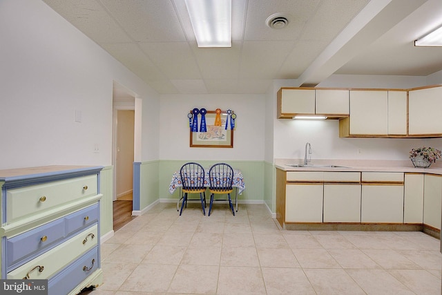 2119 Saint Heather Ln, Gambrills, MD 21054 - kitchen with a sink, light countertops, and baseboards