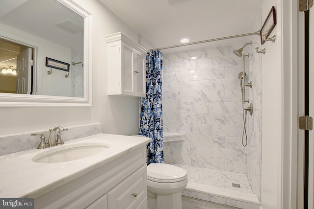 2119 Saint Heather Ln, Gambrills, MD 21054 - bathroom featuring vanity, toilet, a tile shower, and recessed lighting