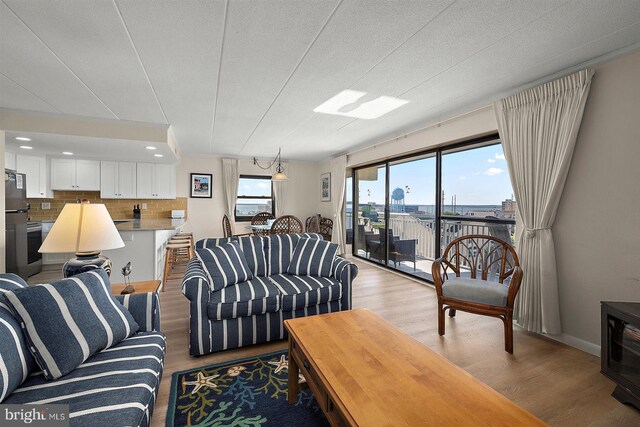 3801 Atlantic Ave Unit 517, Ocean City, MD 21842 - living area featuring wood finished floors, recessed lighting, and baseboards