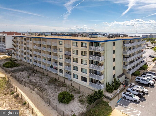 3801 Atlantic Ave Unit 517, Ocean City, MD 21842 - view of apartment building / complex featuring uncovered parking
