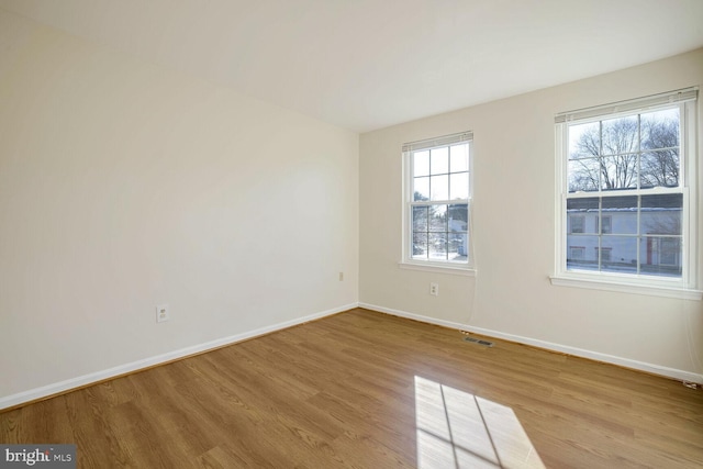 1 Ridge Heights Ct, Gaithersburg, MD 20879 - spare room featuring wood finished floors and baseboards