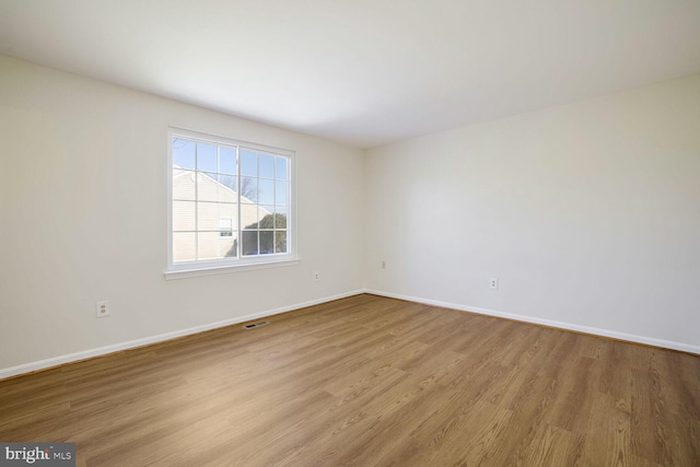 1 Ridge Heights Ct, Gaithersburg, MD 20879 - spare room featuring wood finished floors and baseboards