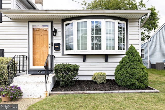 355 Maple Ave, Gloucester City, NJ 08030 - entrance to property with central AC and a lawn