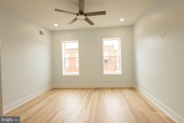 2039 S Cleveland St, Philadelphia, PA 19145 - empty room with plenty of natural light, light wood finished floors, ceiling fan, baseboards, and recessed lighting