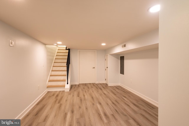 2039 S Cleveland St, Philadelphia, PA 19145 - finished basement with electric panel, recessed lighting, light wood-style flooring, baseboards, and stairway