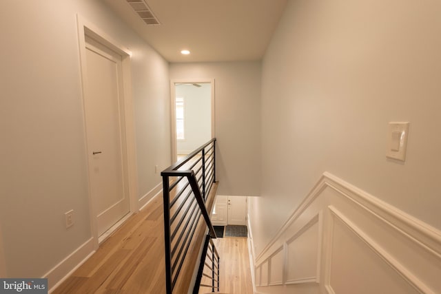 2039 S Cleveland St, Philadelphia, PA 19145 - stairs featuring wood finished floors, recessed lighting, and baseboards