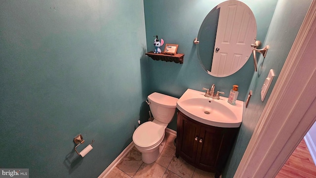 14 Curry Ln, Horsham, PA 19044 - half bathroom with vanity, toilet, and baseboards