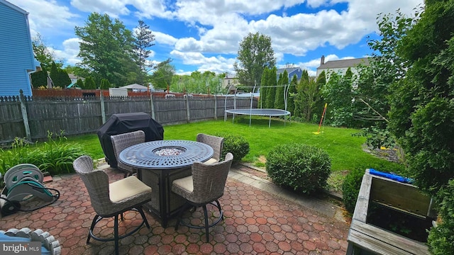 14 Curry Ln, Horsham, PA 19044 - view of patio with a trampoline, outdoor dining area, and area for grilling