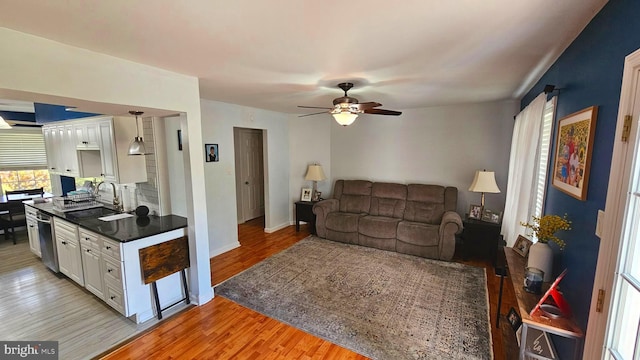 14 Curry Ln, Horsham, PA 19044 - living room featuring light wood finished floors, ceiling fan, and baseboards