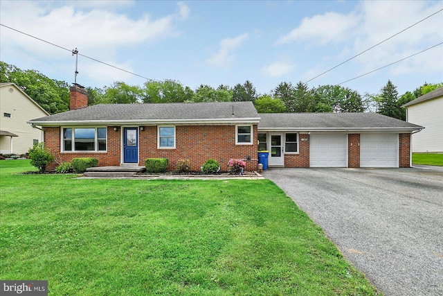 1803 Dubs Church Rd, Hanover, PA 17331 - ranch-style house with an attached garage, driveway, brick siding, a front yard, and a chimney