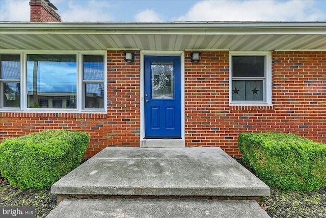 1803 Dubs Church Rd, Hanover, PA 17331 - property entrance with a chimney and brick siding