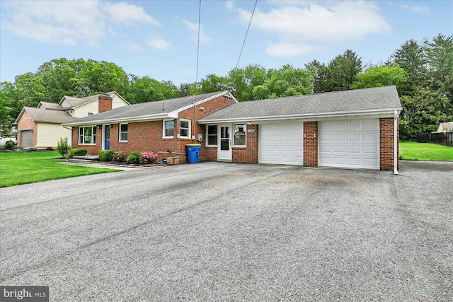 1803 Dubs Church Rd, Hanover, PA 17331 - view of front of property with brick siding, a front lawn, and an attached garage