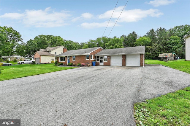 1803 Dubs Church Rd, Hanover, PA 17331 - ranch-style home featuring brick siding, a garage, a front yard, and asphalt driveway