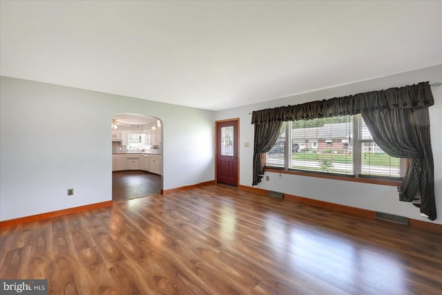 1803 Dubs Church Rd, Hanover, PA 17331 - foyer entrance featuring wood finished floors, baseboards, and arched walkways