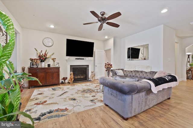 5544 Old Colony Ct, White Plains, MD 20695 - living room featuring ceiling fan, wood finished floors, a glass covered fireplace, and recessed lighting
