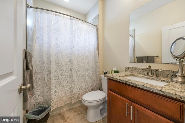 5544 Old Colony Ct, White Plains, MD 20695 - bathroom with toilet, vanity, and tile patterned floors
