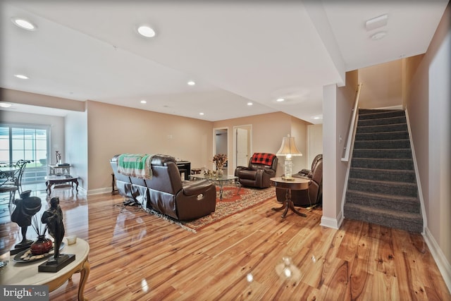 5544 Old Colony Ct, White Plains, MD 20695 - living room with light wood-type flooring, baseboards, stairway, and recessed lighting