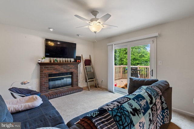 2 Jonquil Pl, Stafford, VA 22554 - living room with carpet, a ceiling fan, a brick fireplace, and baseboards