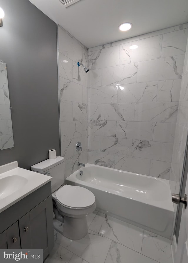 1512 W Pratt St, Baltimore, MD 21223 - bathroom with shower / bathtub combination, vanity, marble look tile flooring, toilet, and recessed lighting