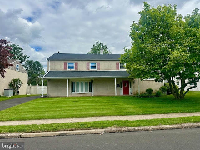 713 Worthington Dr, Warminster, PA 18974 - traditional home featuring brick siding and a chimney