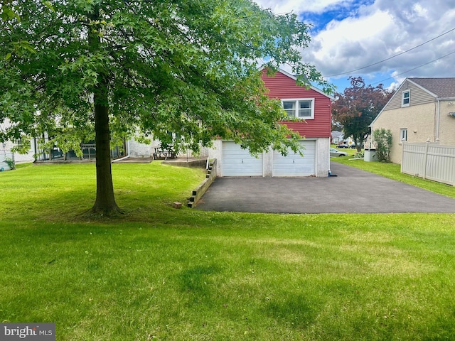 713 Worthington Dr, Warminster, PA 18974 - view of yard with driveway and a garage